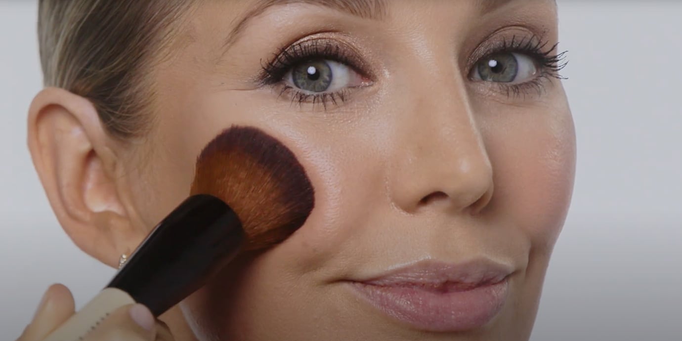 Video still of Global Pro Artist Amy Conway, applying blush to cheeks